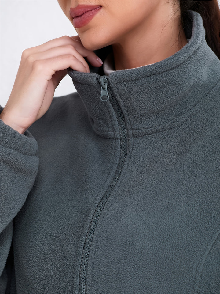 Dames winterjas | Fluffy fleece jas met hoge kraag en zakken
