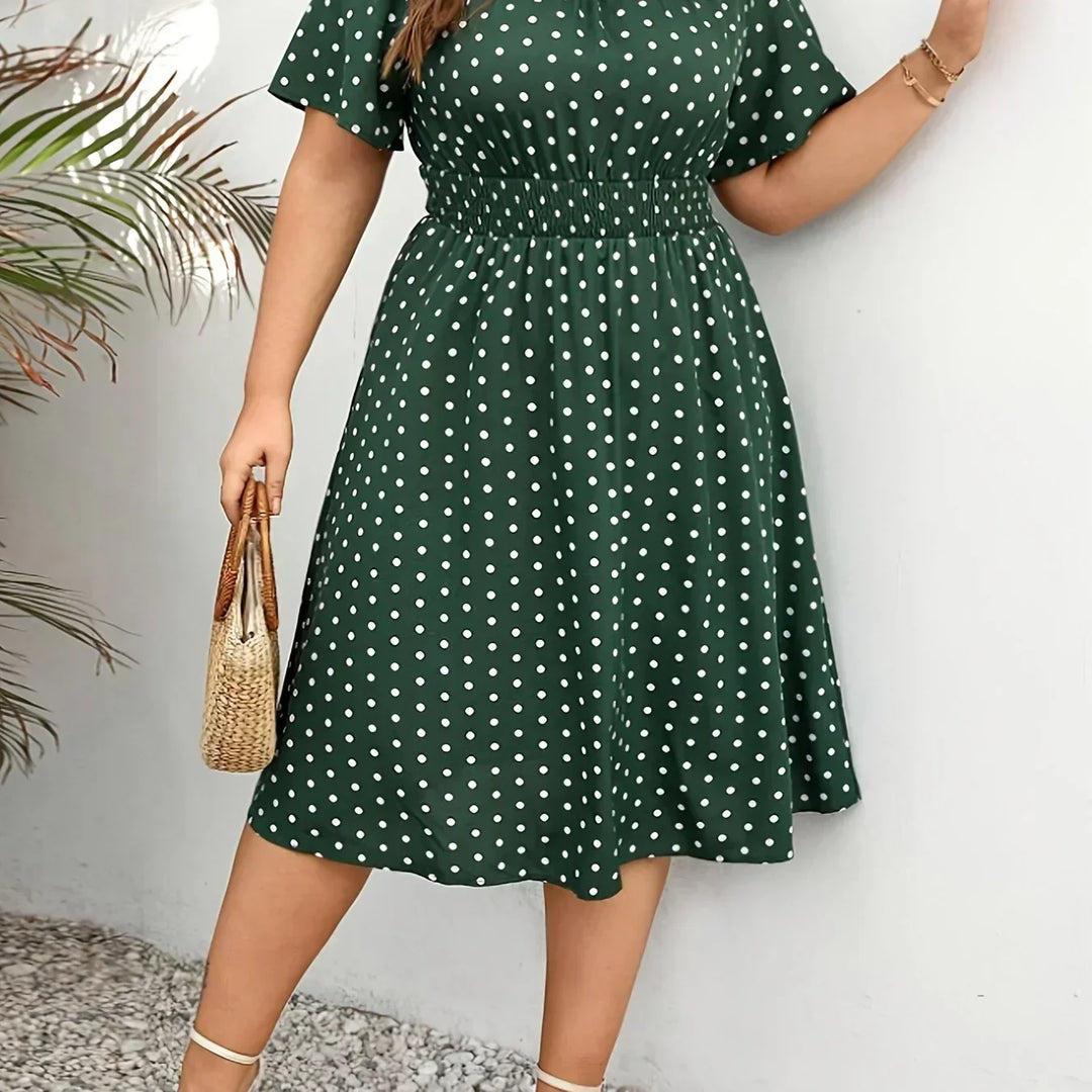 Dames jurk | Groene stippen jurk met elastische taille