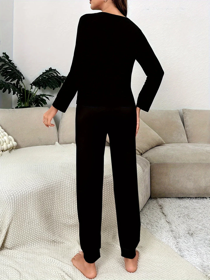 Dames pyjama set | Let Me Sleep slogan met roze joggerbroek